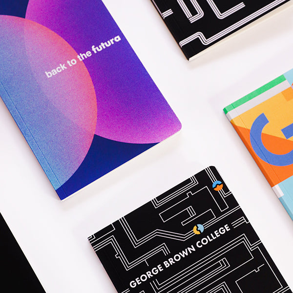 Back to the Futura Notebook with pink, blue and purple circular gradient shapes