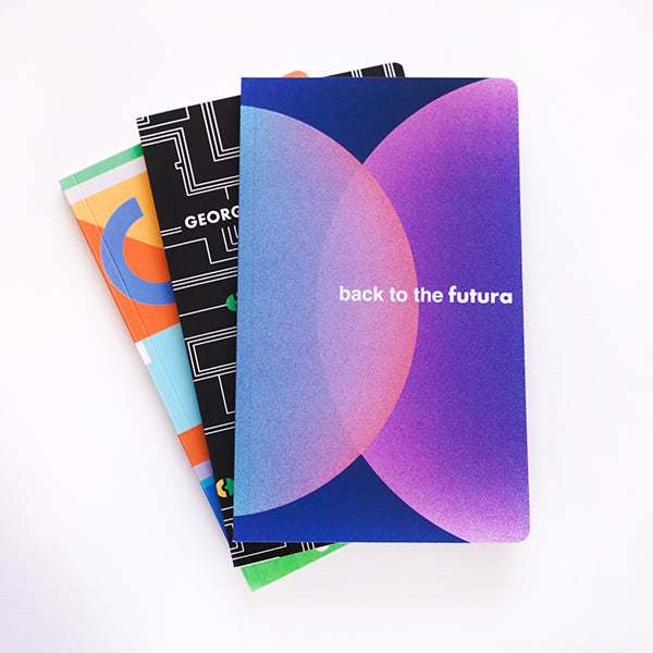 Back to the Futura Notebook with pink, blue and purple circular gradient shapes