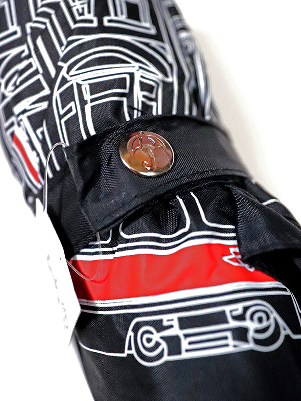 black umbrella with toronto street car illustration in white and red