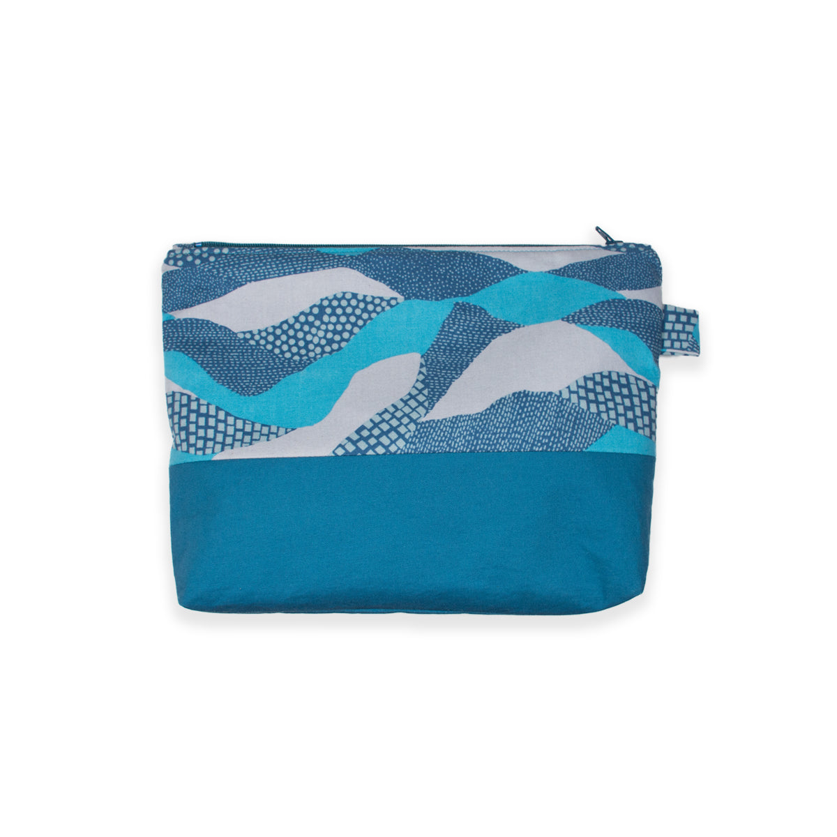 100% cotton zip case featuring abstract wave design in various shades of blue