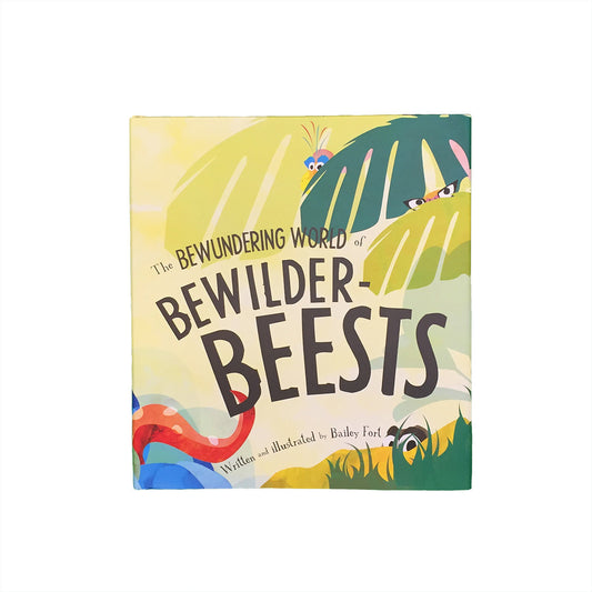 the bewundering world of bewilder beests book cover with illustrations of leaves and grass with little animal eyes poking out