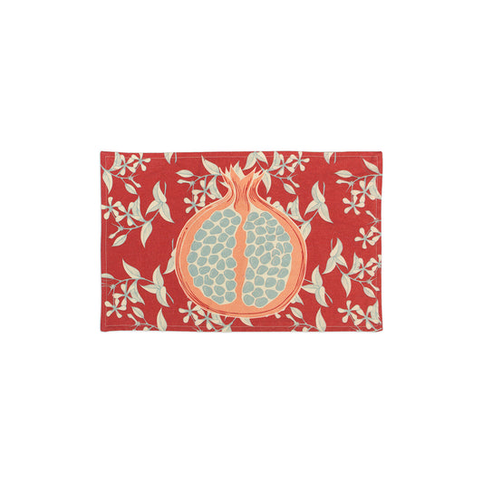 13" x 20" 100% cotton canvas red placemat with student made pomegranate illustration in the middle, with floral and leave pattern in the background