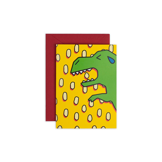 4 1/2" x 6 1/4"  yellow greeting card with illustration of a green dinosaur and yellow dots in the background, student made