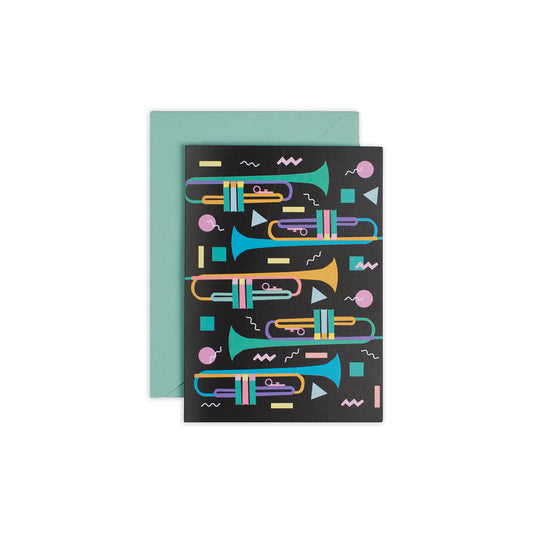 4 1/2" x 6 1/4" black greeting card featuring an illustration of trumpets in fun memphis style colours and shapes
