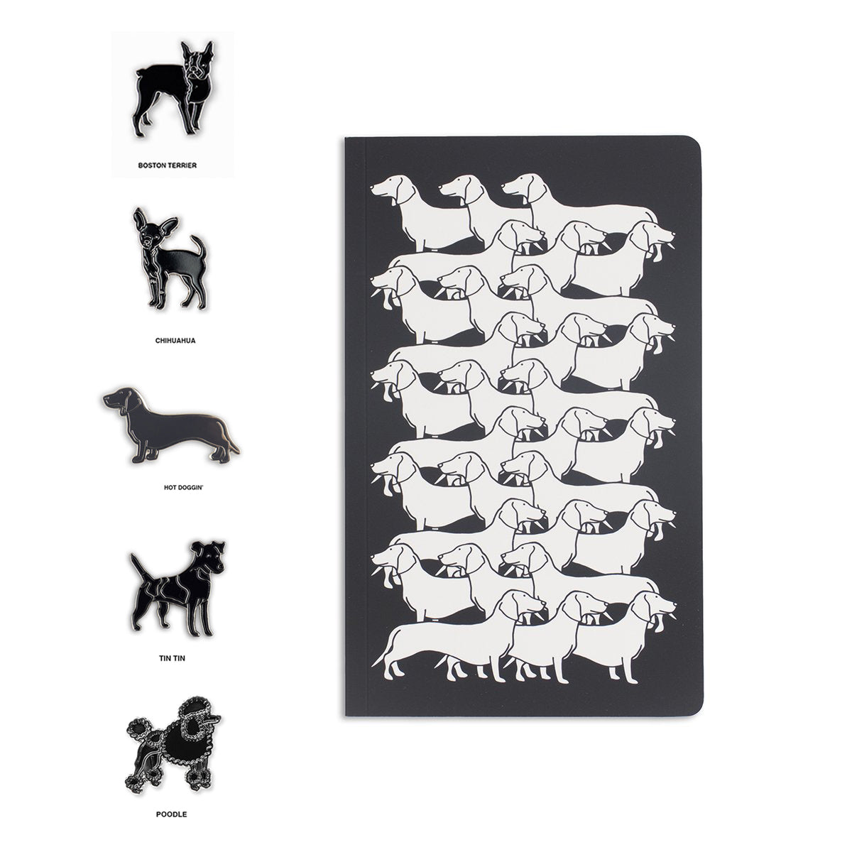 black notebook with horizontal dog illustration pattern in white, and assorted black dog enamel pins bundle