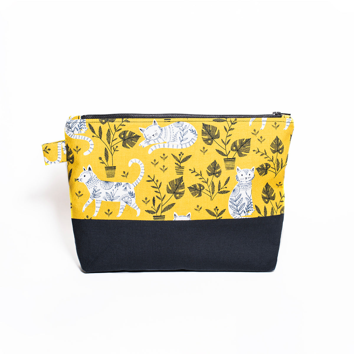 100% cotton zip case in yellow and black featuring various illustrations of white cats and house plants in black