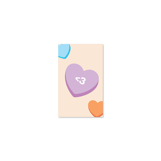 purple candy heart with "<3" written on it