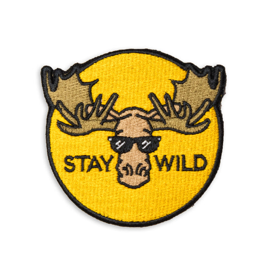 3" x 3" embroidered yellow circle patch with moose illustration with sunglasses and stay wild text