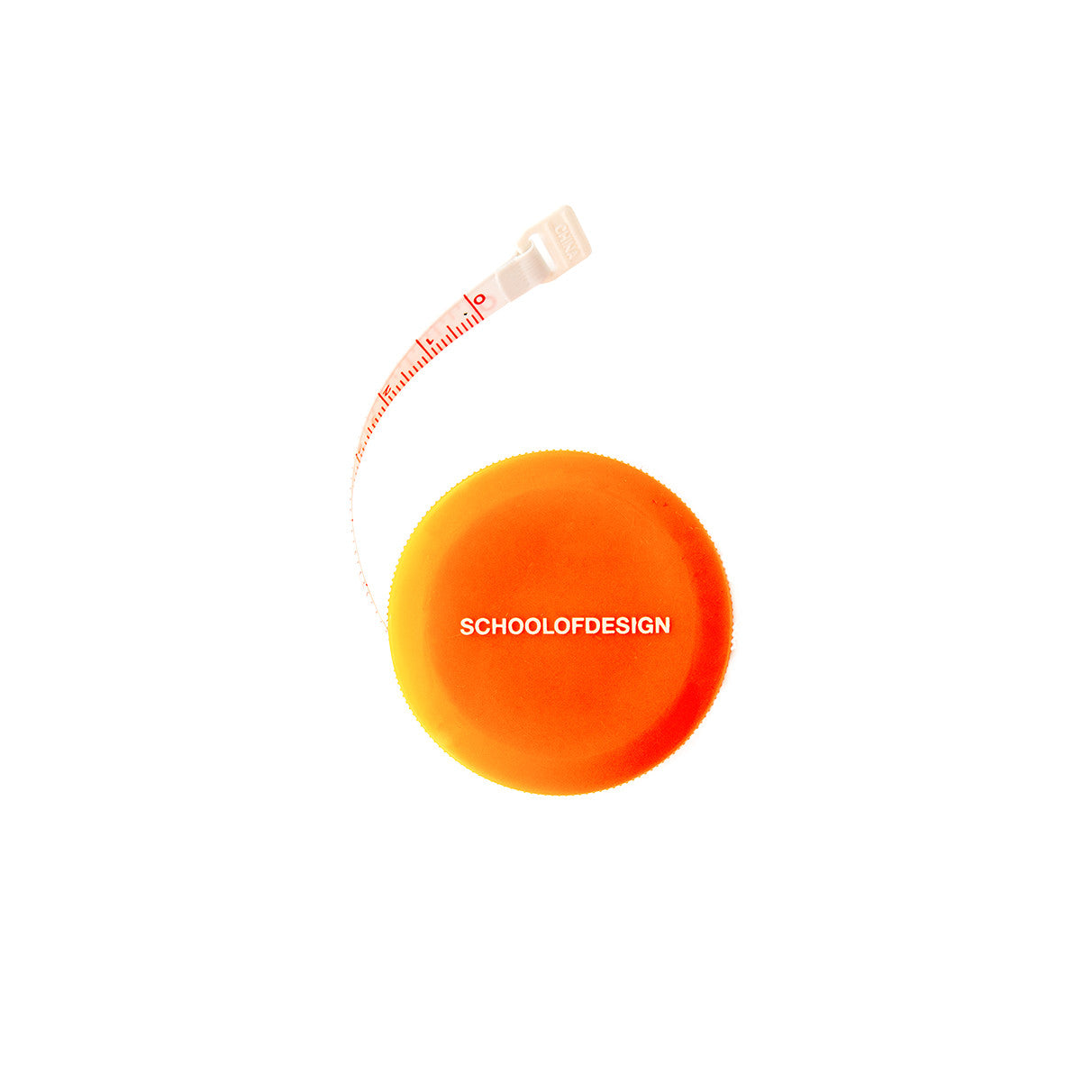circular orange plastic tape measure with school of design white text on the front