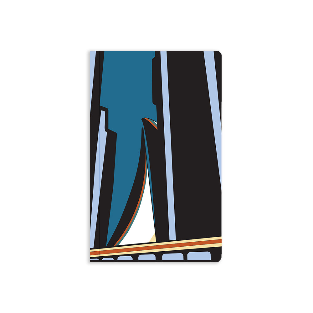 5" x 8.25" soft cover notebook with black, teal, blue, red and yellow abstract lines in various weights