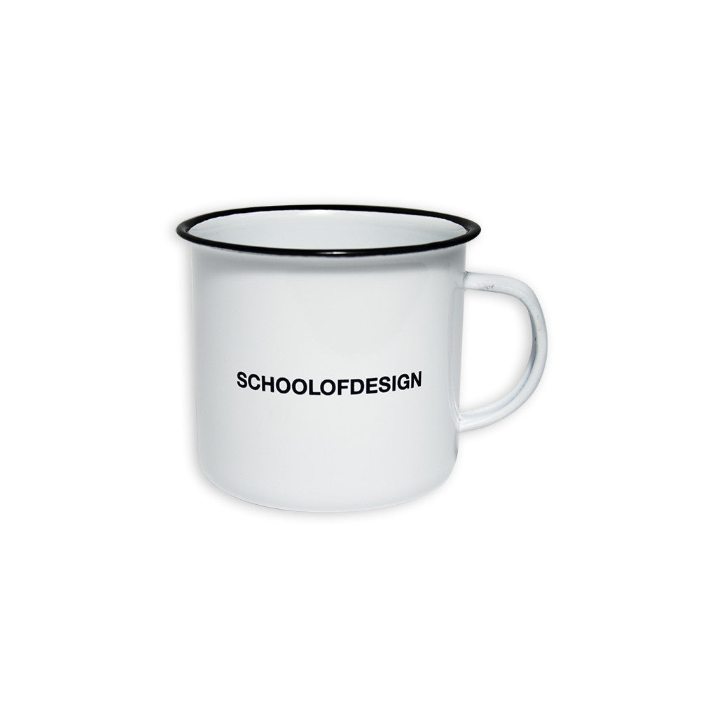 white enamel mug with stainless steel rim featuring school of design text in black