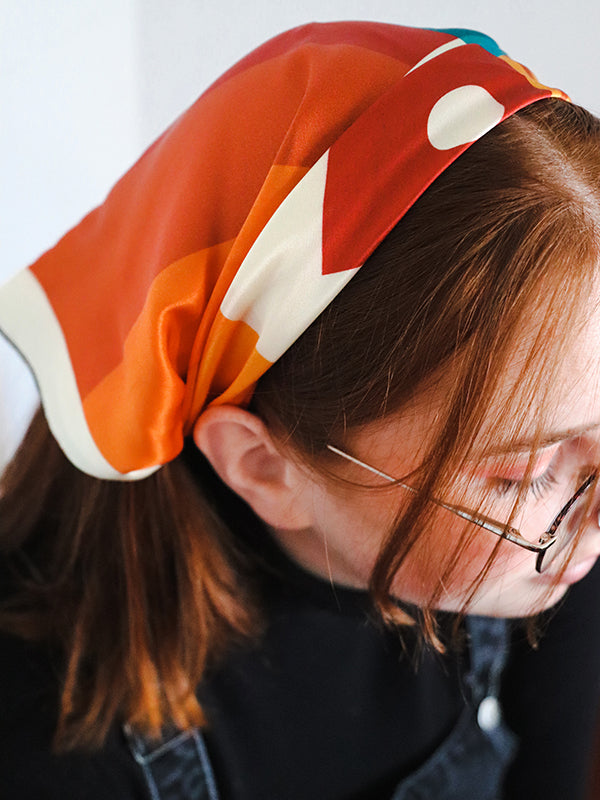 person wearing silk bandana