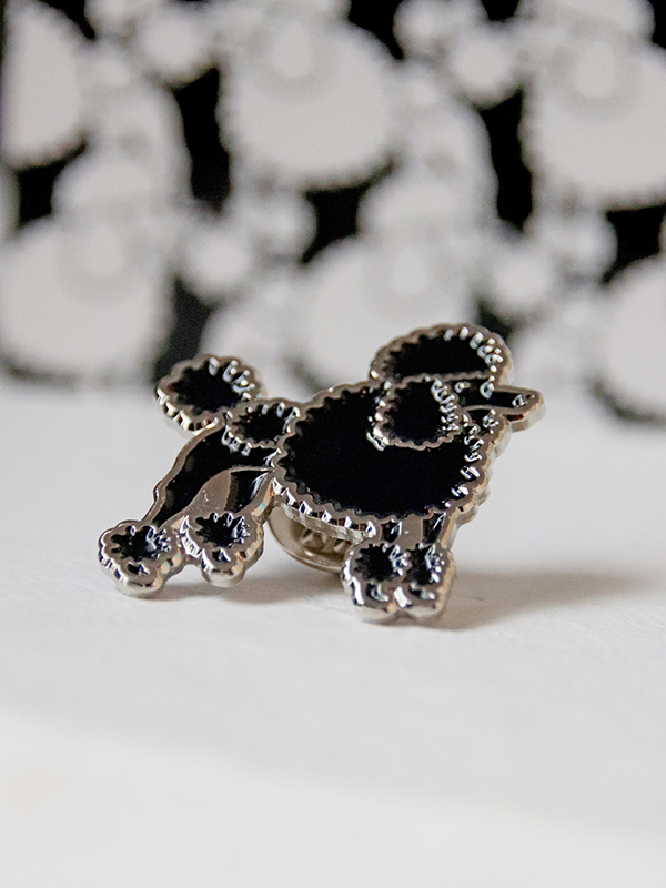 black poodle enamel pin with silver outline